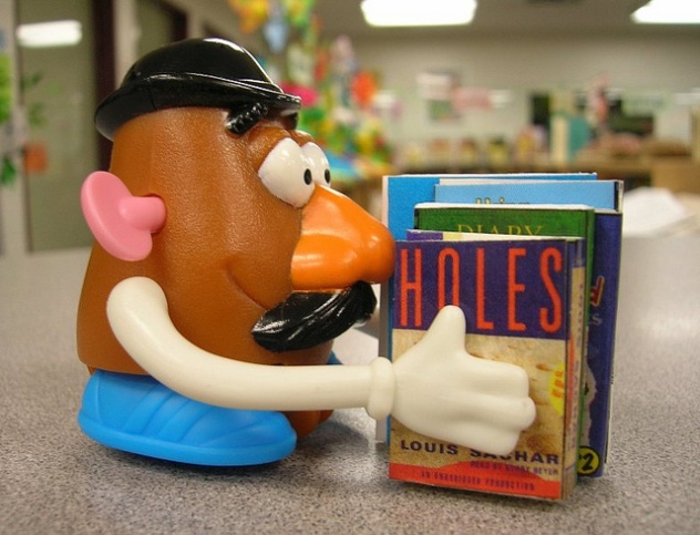 Mr. Potato Head has his nose in a bood by Enokson on CC Flickr